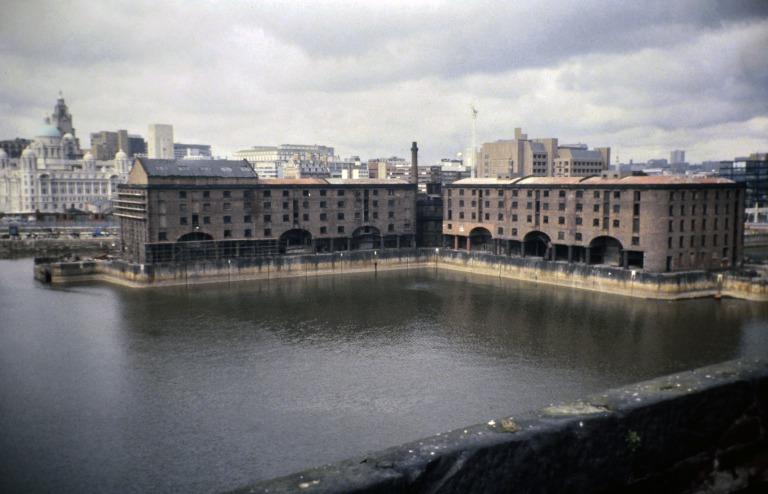 Photograph of Albert Dock, Liverpool, Blocks D, later Merseyside Maritime Museum and E from roof of Block B. card