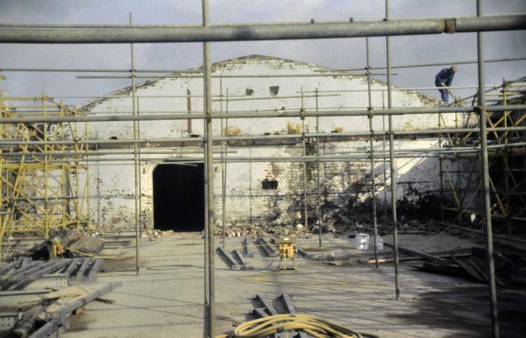 Photograph of renovation of Albert Dock, Liverpool, Block D, later Merseyside Maritime Museum, fourth floor after cold storage roof addition demolished and prior to installation of new roof. card