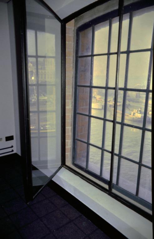 Photograph of renovation of Albert Dock, Liverpool, Block D, later Merseyside Maritime Museum, second floor, view of new cast aluminium outer window and open plain inner window. card