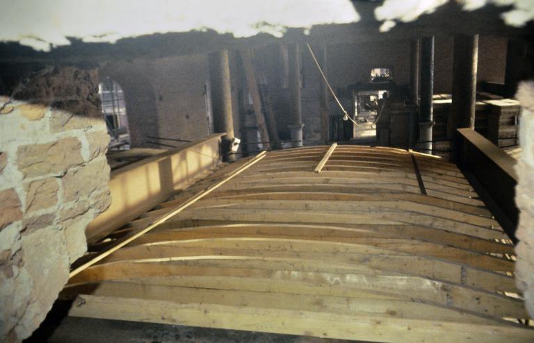Photograph of renovation of Albert Dock, Liverpool, Block D, later Merseyside Maritime Museum, formwork prior to plywood sheeting on which brick vaulting will be laid prior to concrete floor being poured above bricks. card