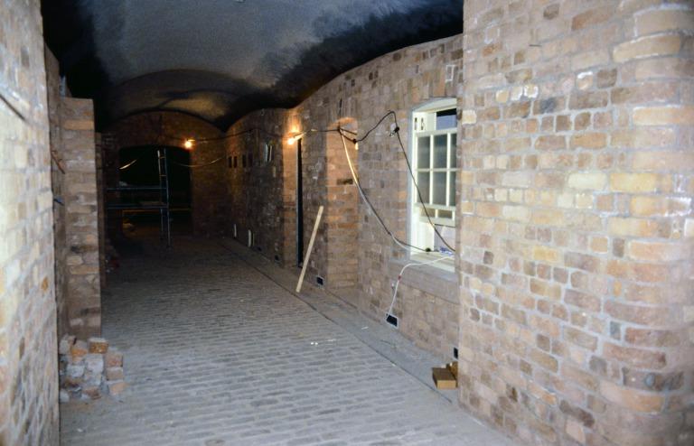 Photograph of renovation of Albert Dock, Liverpool, Block D, Merseyside Maritime Museum, basement showing installation of display street and buildings in Emigrants to a New World gallery. card