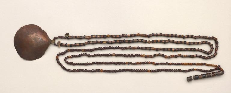 String of Beads with a Shell Pendant card
