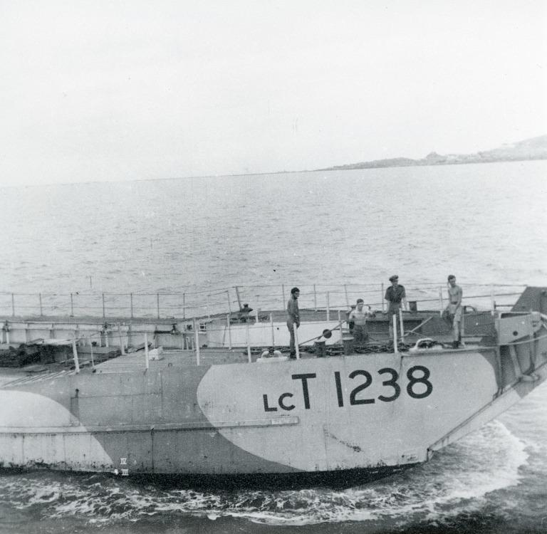 S.S. Dramatist, Harrison Line, coming alongside landing craft LCT 1238 ...