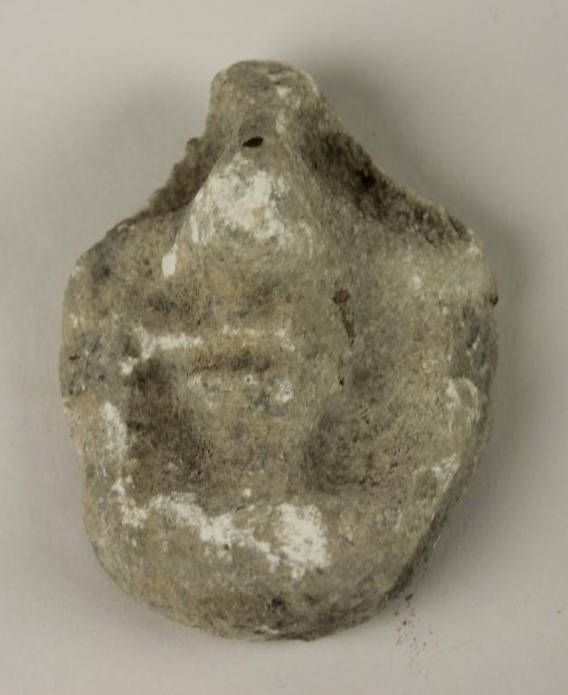 Fragment from a head of a votive statuette card