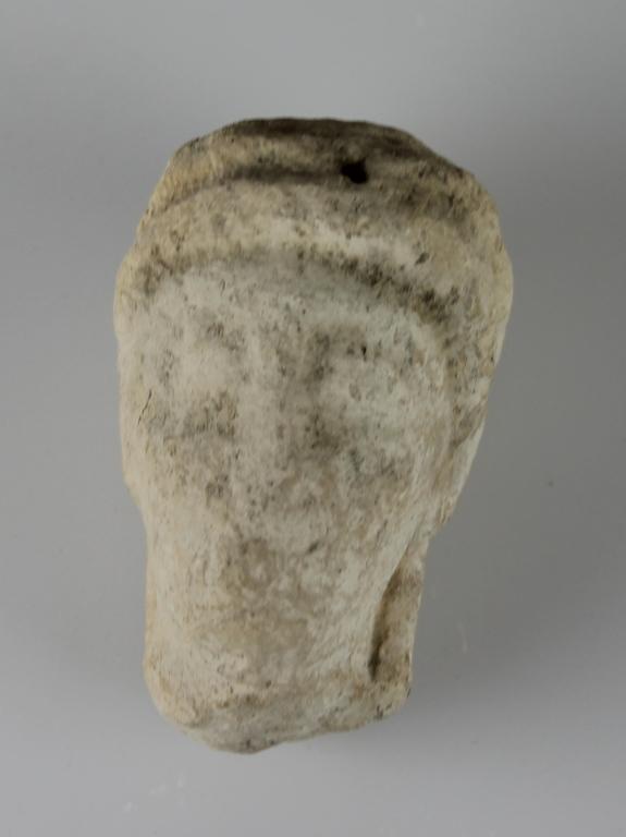Head from a votive statuette card