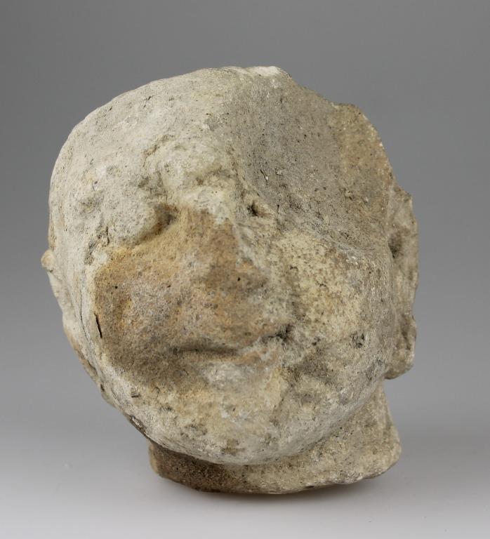 Head Of A Female Votive Statuette 