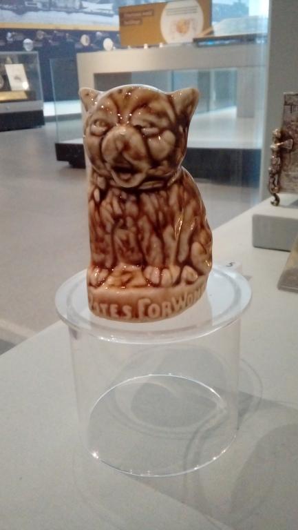 Porcelain cat figurine, 'Votes for Women' card