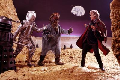 Dalek, Cyberman and Sea Devil facing Jon Pertwee as the Doctor