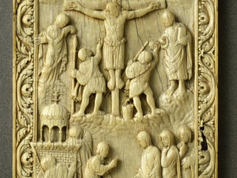 Bookbinding depicting The Crucifixion with women at the Sepulchre